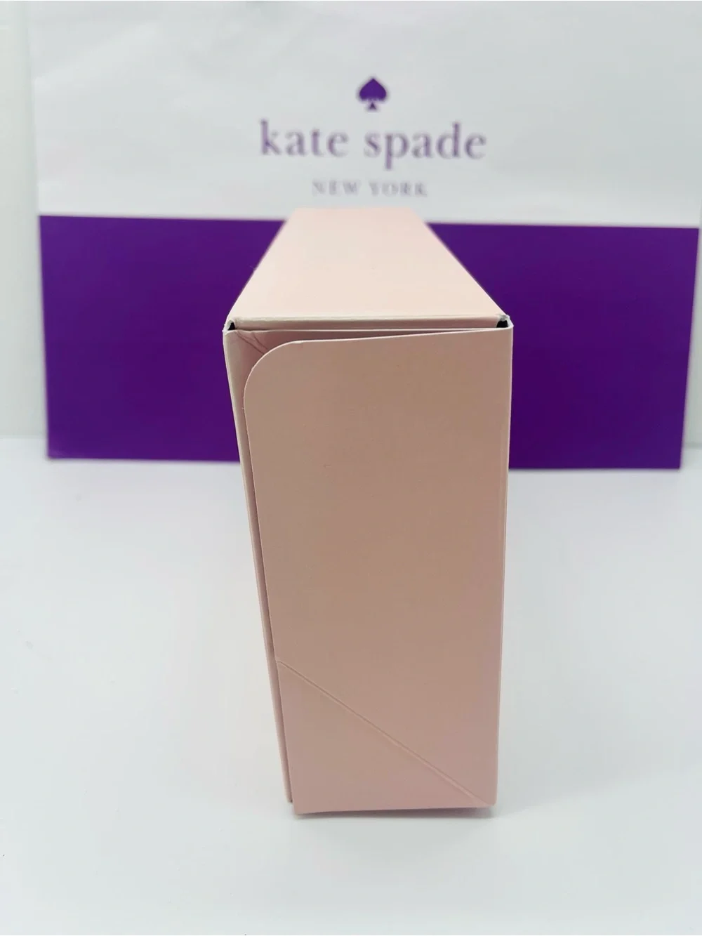 kate spade blush pink gift box with purple logo bag New